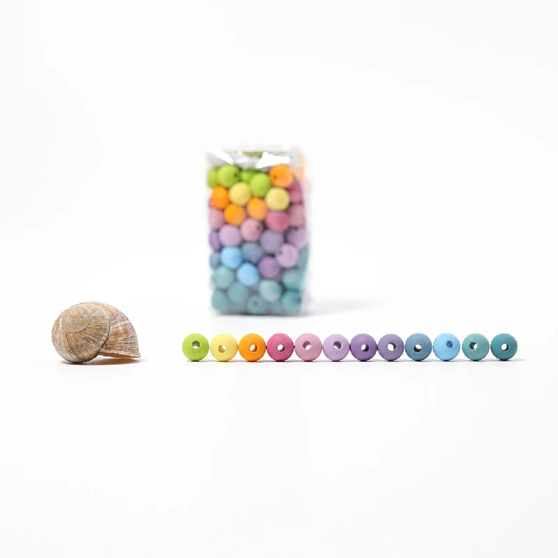 Wooden guitars for pretend musicians 120 Tiny Pastel Wooden Beads - Wood Beads - Grimm's Wooden guitars for pretend musicians 120 Tiny Pastel Wooden Beads - Wood Beads - Grimm's