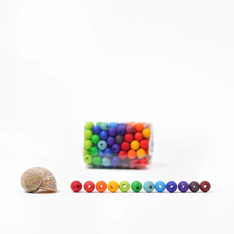 Wooden flutes for musical exploration 120 Tiny Rainbow Wooden Beads - Wood Beads - Grimm's Wooden Toys Wooden flutes for musical exploration 120 Tiny Rainbow Wooden Beads - Wood Beads - Grimm's Wooden Toys