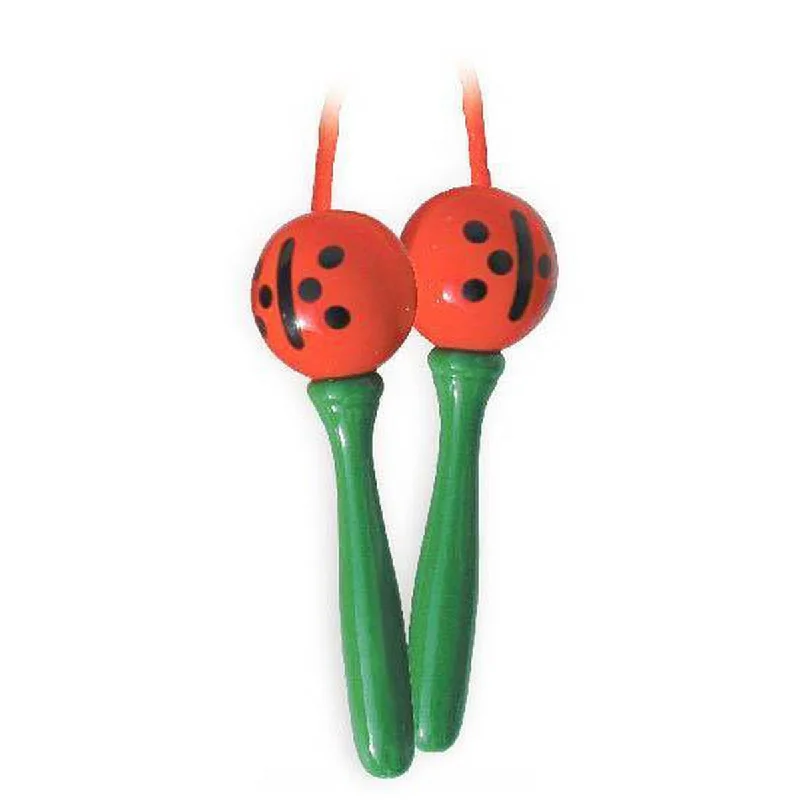 Wooden play helicopters for air travel play​ Vilac ladybug skipping rope