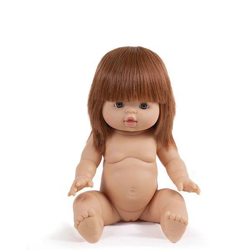 Dolls with 1920s - style accessories for a vintage feel​ Minikane Capucine doll